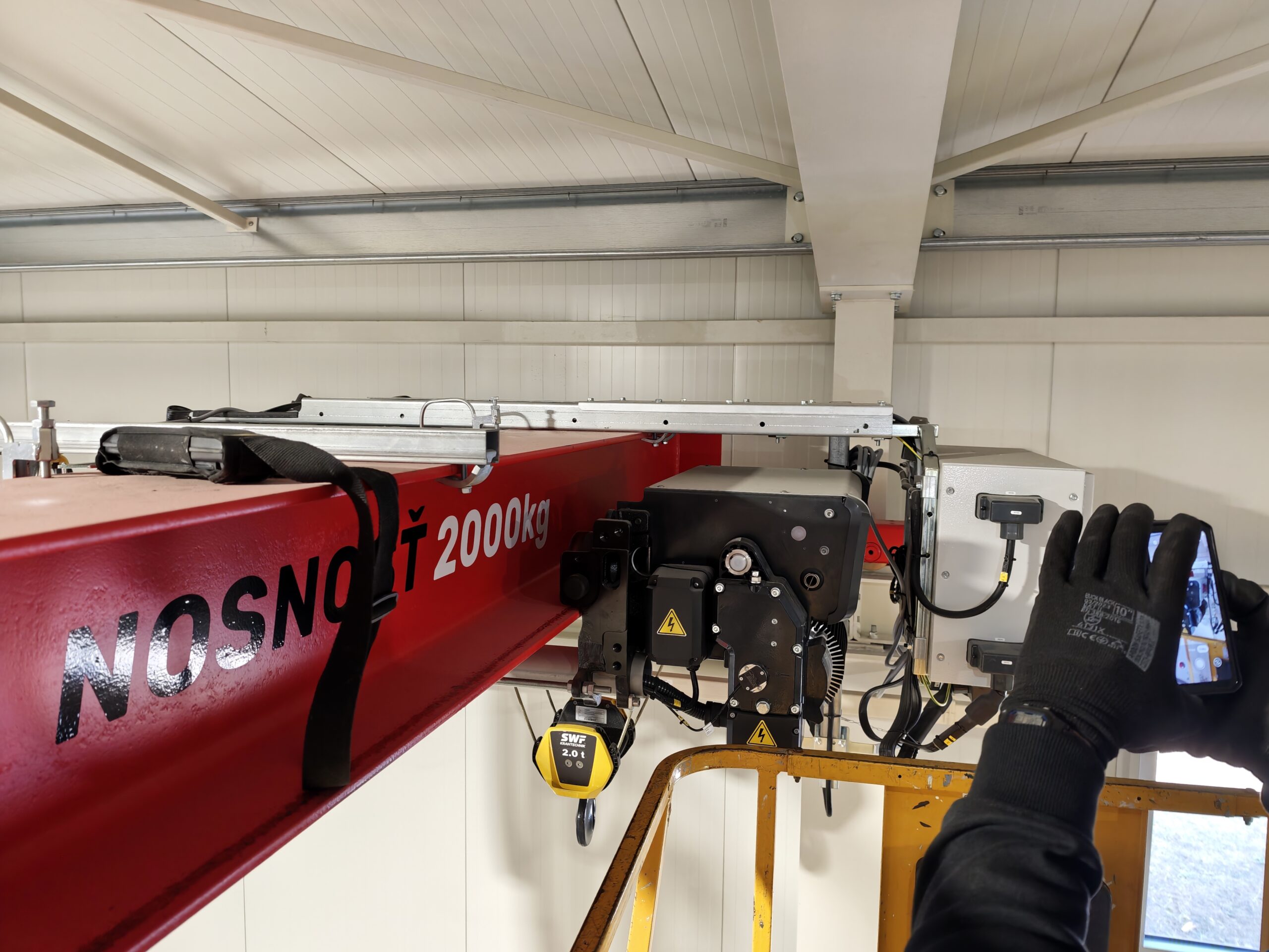 Inspection of the bridge crane's technical condition, photographed from the work platform